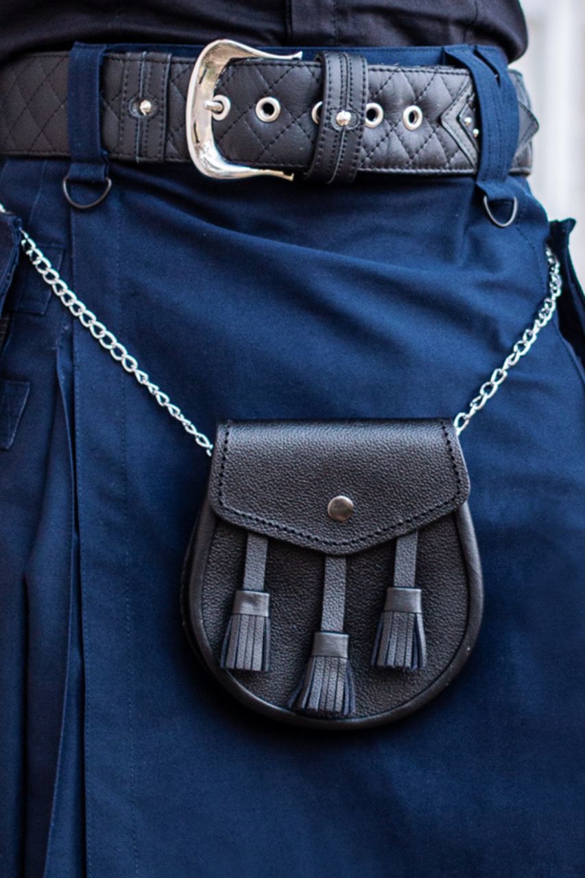 Navy blue kilt with a black leather sporran and belt