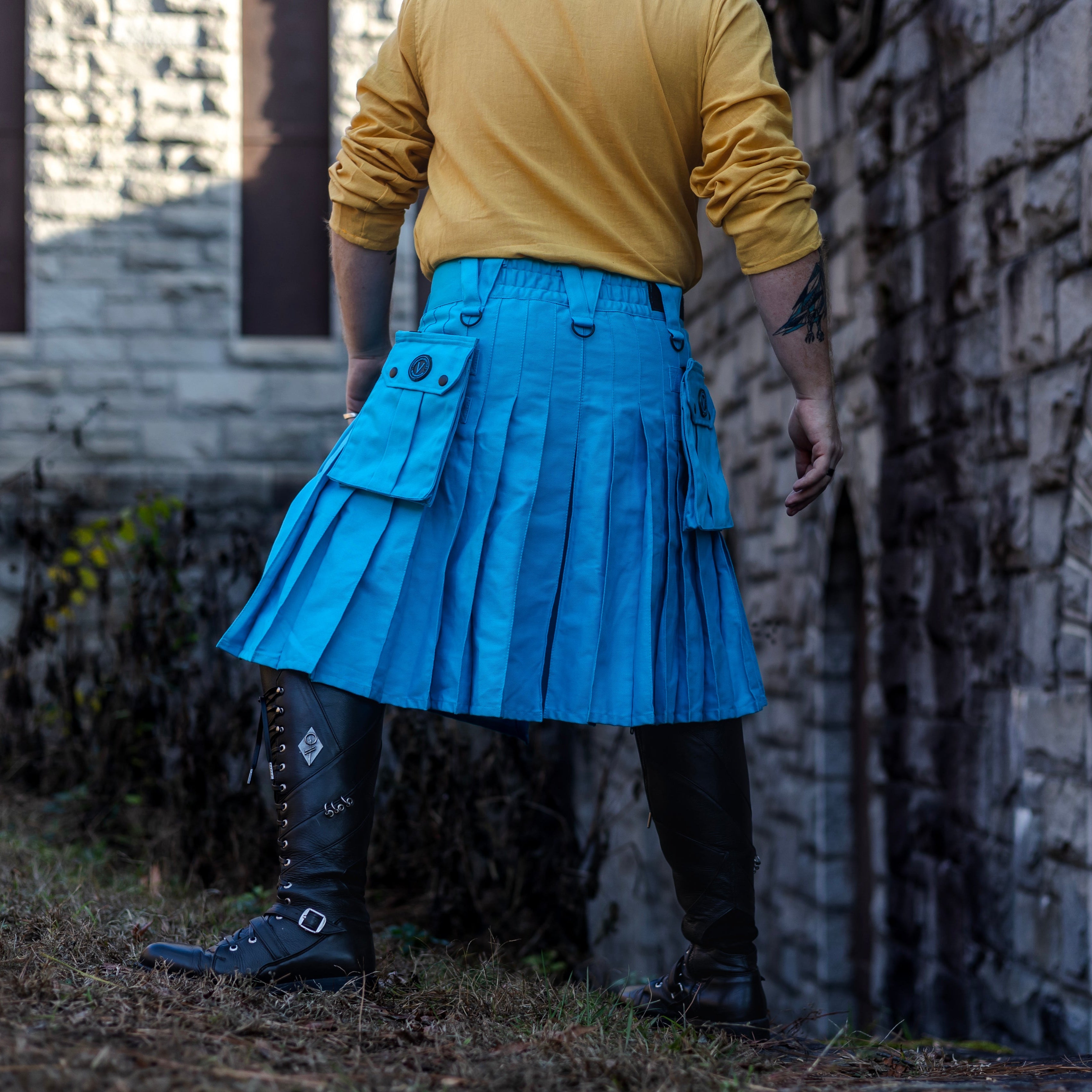 23" Versatta Cargo Kilt in Cyan, with grommet belt and cargo pockets.