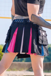Close up back view of a person in a black and trans pride-themed mini kilt with a black leather belt.